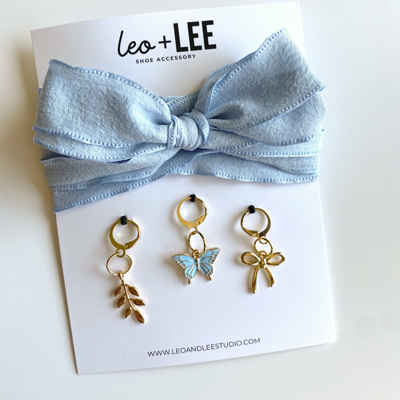 Blue Shoe Laces with Fern, Butterfly & Bow Shoe Charm Set